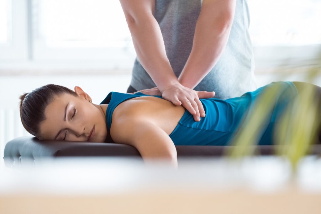 Woman at a physio getting a remedial massage